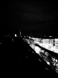View of illuminated city at night