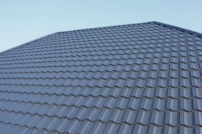 Low angle view of modern building against clear sky