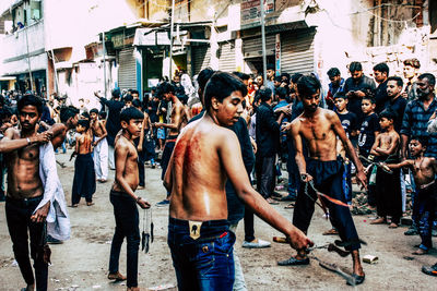 Group of people on street in city