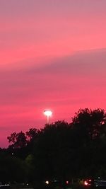 Silhouette trees against sky during sunset