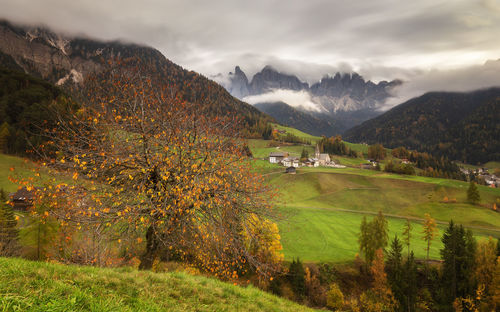 Scenic view of landscape and mountains against sky