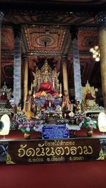 Statue in temple outside building