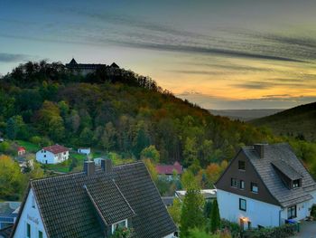 High angle view of townscape against sky during sunset