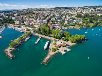 High angle view of boats in city