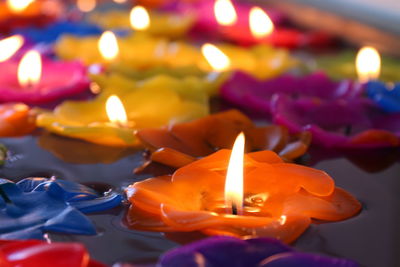 Close-up of lit tea light candles