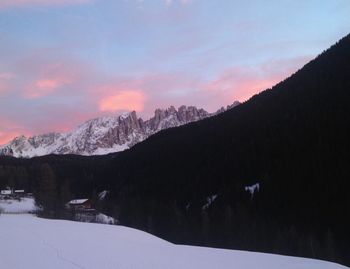 Scenic view of mountains against sky during sunset