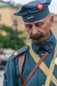 Portrait of man standing outdoors