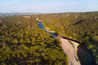 High angle view of trees on landscape against sky