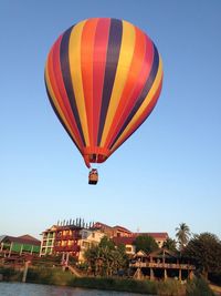 Hot air balloons against clear blue sky