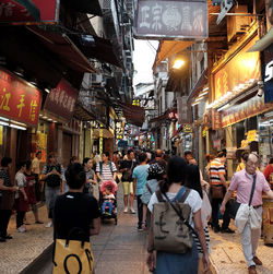 People walking on street in city