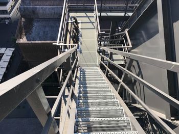 High angle view of staircase amidst buildings