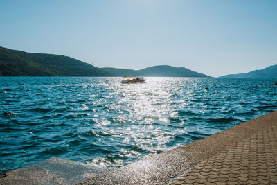 Scenic view of sea against clear sky