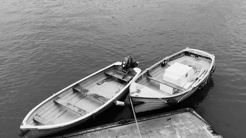 High angle view of boat moored in lake