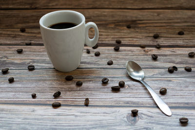 Close-up of coffee cup on table