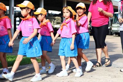 Group of people standing on road