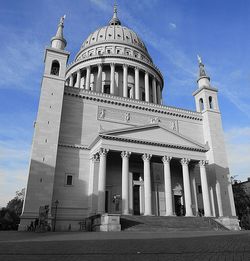 Low angle view of church against blue sky