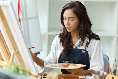 Woman working on table