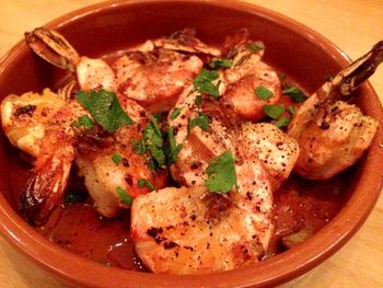 Close-up of prawns served in bowl on table