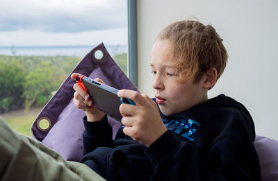 Young man using mobile phone