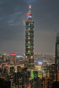 Illuminated buildings in city at night