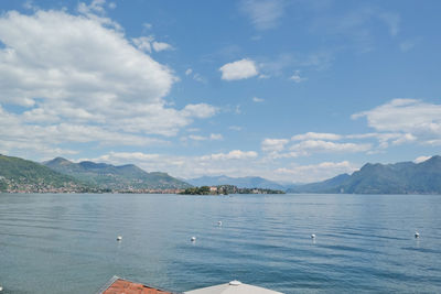 Scenic view of mountains against cloudy sky