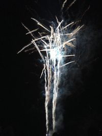 Close-up of firework display against sky at night