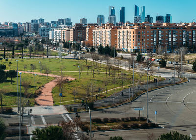 High angle view of road amidst buildings in city