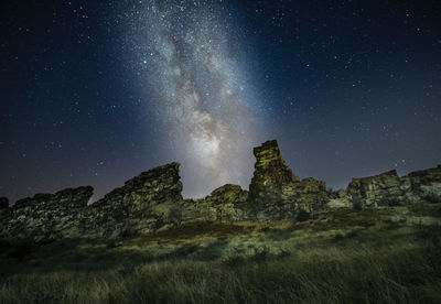 Low angle view of star field against sky at night