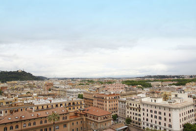 Rome and vatican city skyline from window of the vatican museum in cloudy day