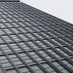 Low angle view of office building against sky