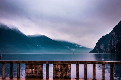 Scenic view of lake against sky during winter