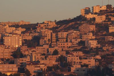 Buildings in city against sky