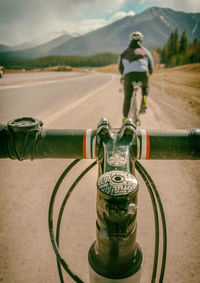 Close-up of bicycle against mountain