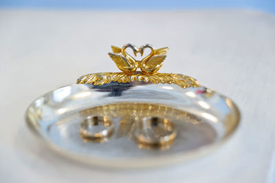 Close-up of ornate glass on table