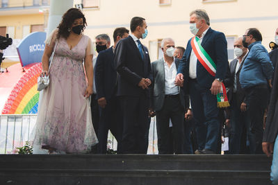 Group of people standing in front of building