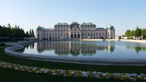 Front view of historic buildings against clear sky