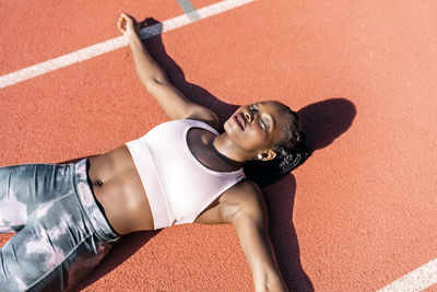 Full length of woman lying down