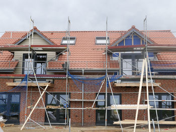 Low angle view of residential building against sky