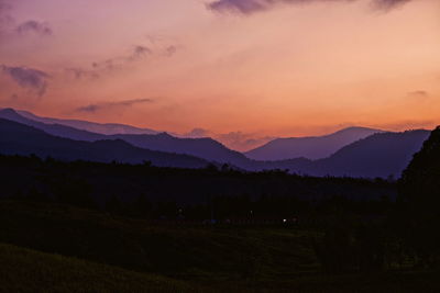 Scenic view of mountains against sky during sunset