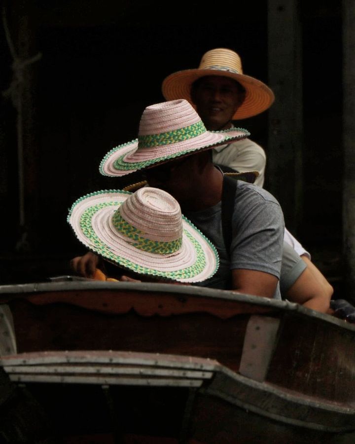 hat, one person, clothing, real people, sitting, men, adult, three quarter length, traditional clothing, front view, lifestyles, portrait, sombrero, sun hat, casual clothing, day, mid adult, males