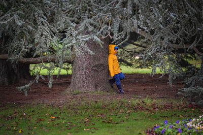 Full length of man walking in forest