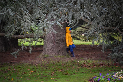 Boy in the park during autumn walk