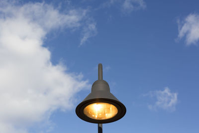 Low angle view of blue sky and clouds