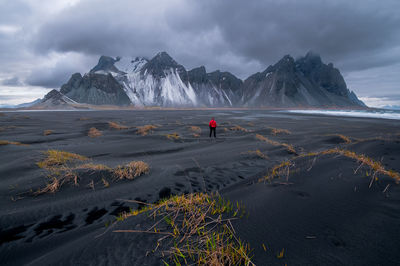 Man looking at mountain 