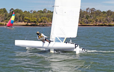 View of sailboat sailing on sea