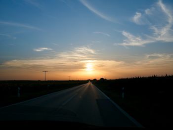 Road against sky during sunset