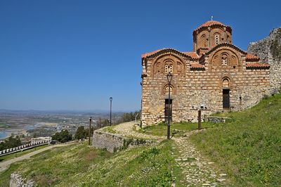 Historic building against clear blue sky