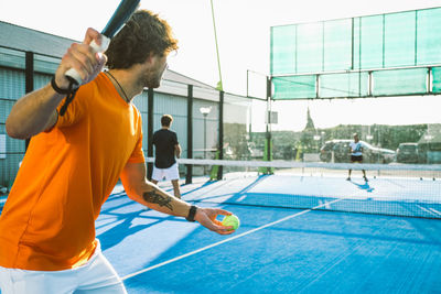 Man playing tennis