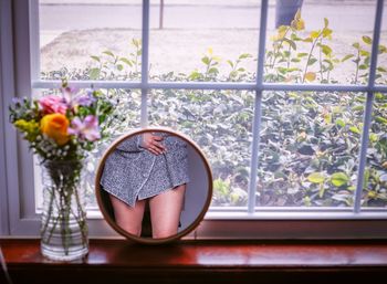 Flower vase on window sill