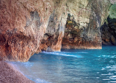 Scenic view of rock formation in sea